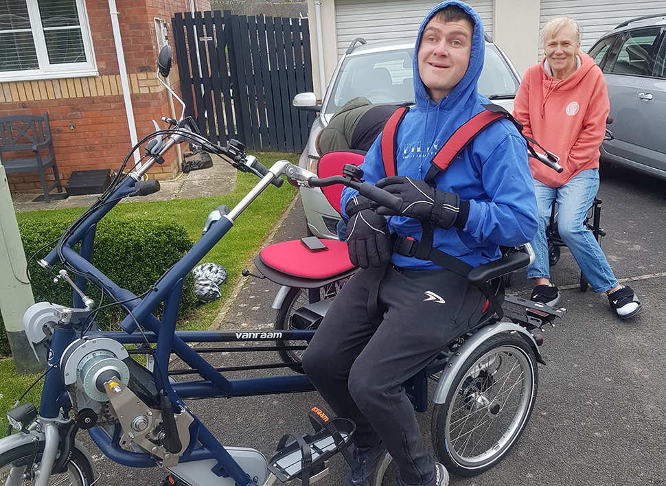 Ruairi with a specialist bike Alex TLC helped to fund